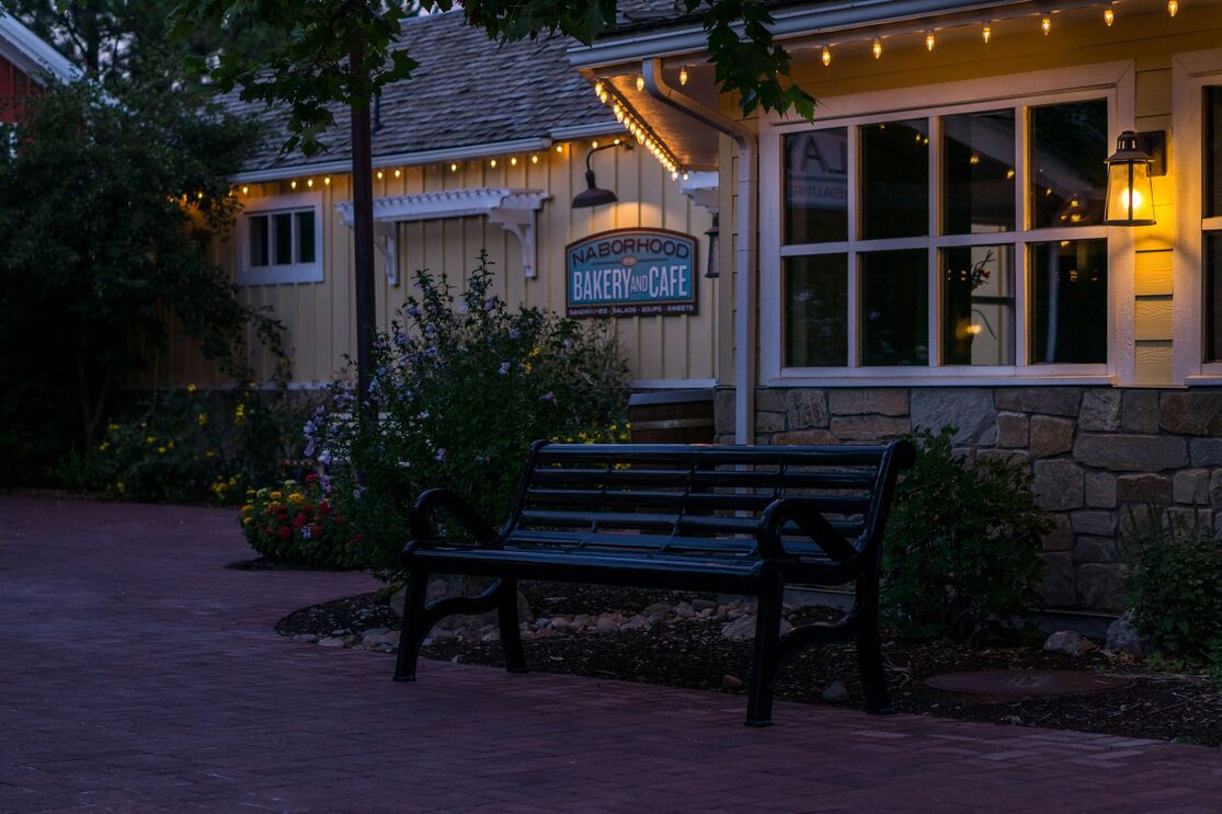 clubhouse view with sign on back wall that says 