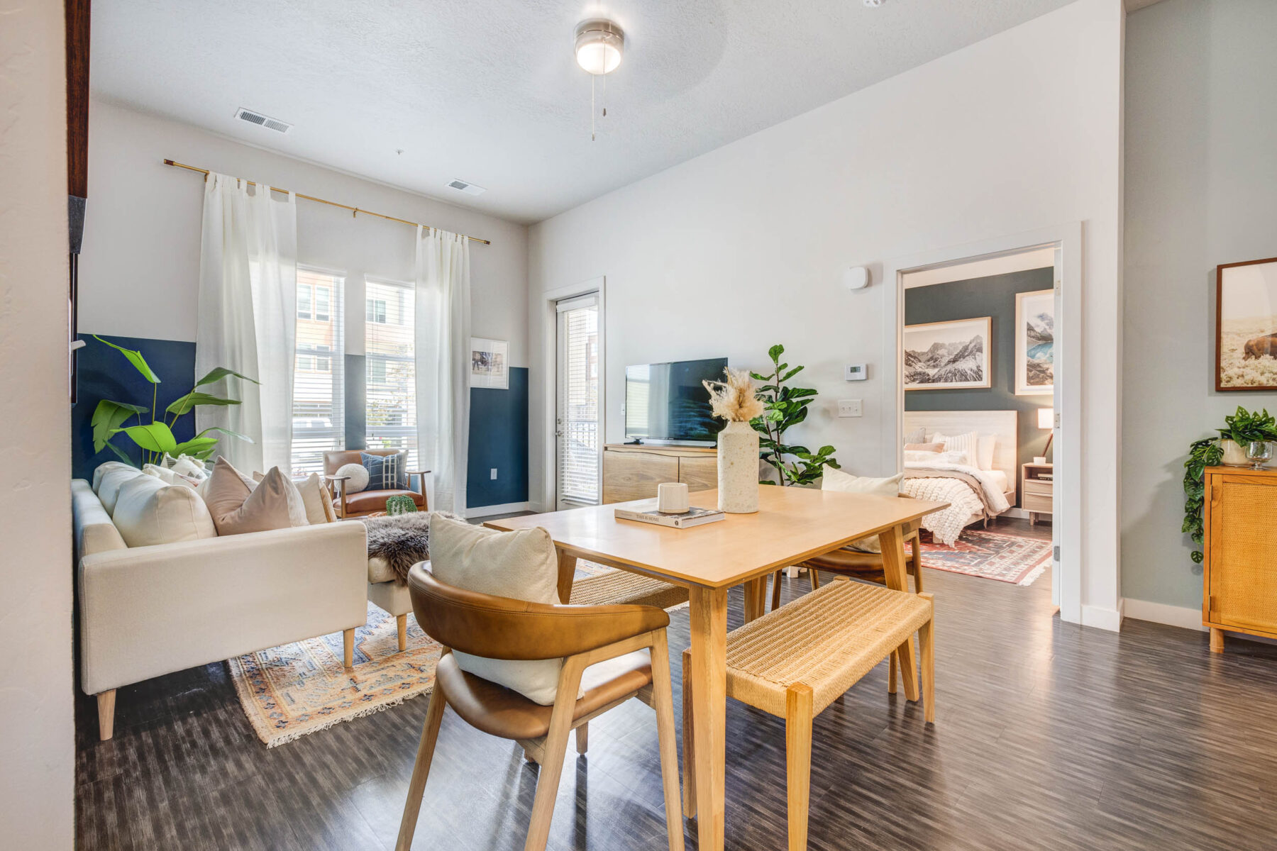 living room area with view of dining and sitting area