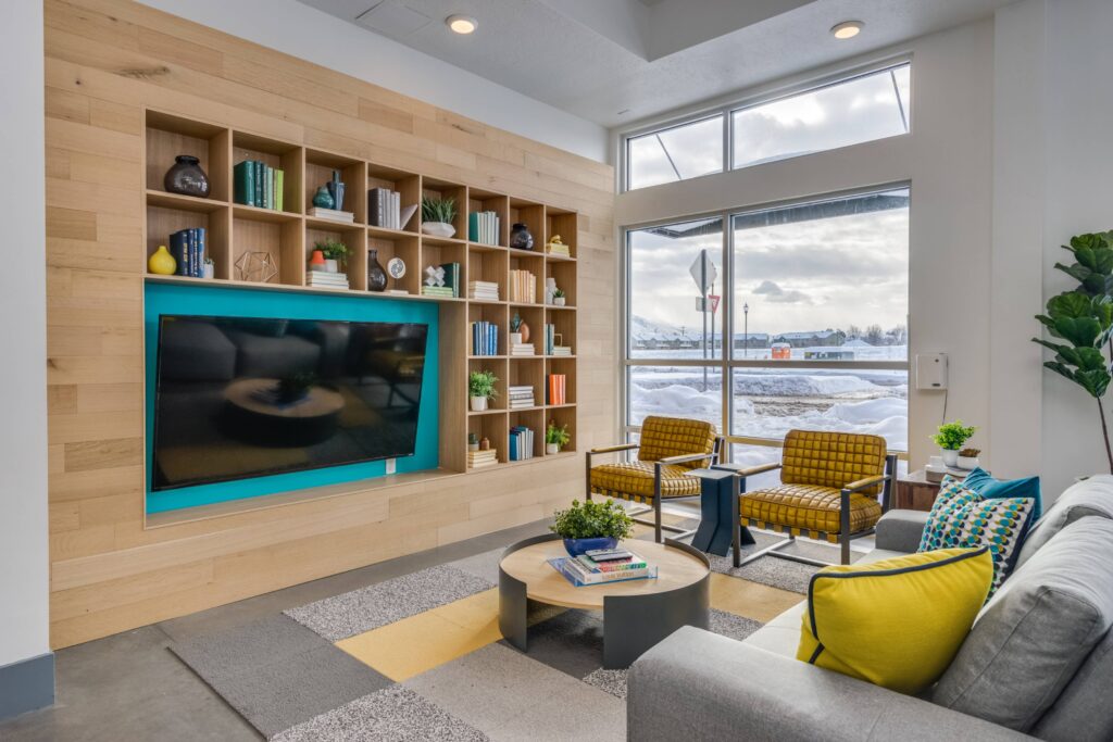 Clubhouse lounge with sofas and TV