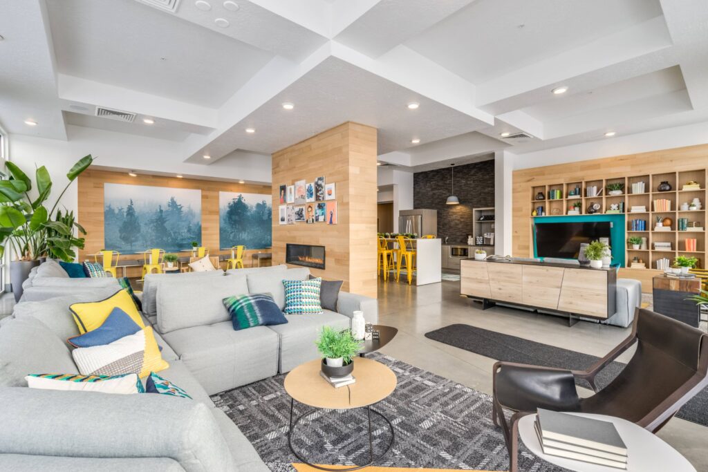 Clubhouse lounge with sofas and fire place