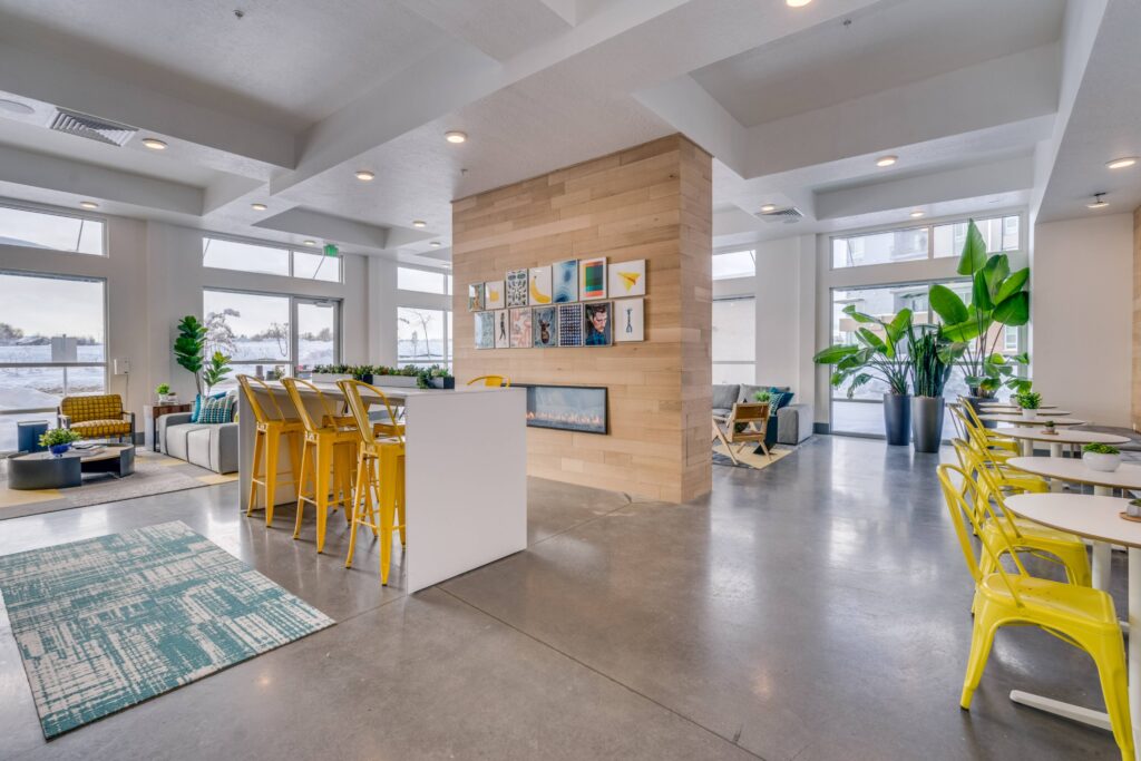 Clubhouse lounge with large fireplace in the center